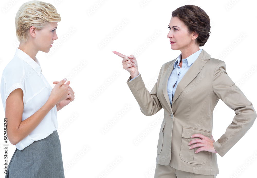 Businesswomen having a violent debate in office Businesswomen having a violent debate in office