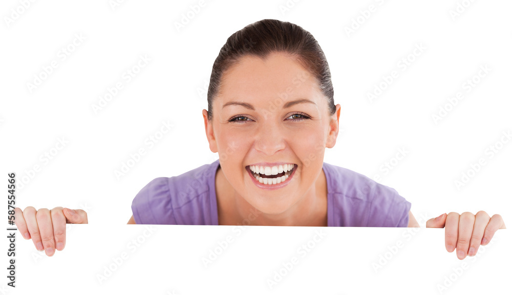 Portrait of a good looking woman posing behind a billboard while standing Portrait of a good looking woman posing behind a billboard while standing