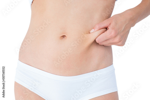 Woman posing without any fat on her belly