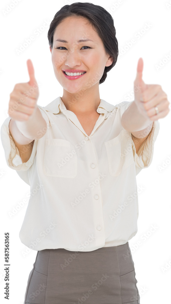 Business colleagues gesturing thumbs up in office Business colleagues gesturing thumbs up in office