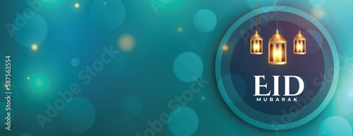 bokeh style eid ul fitr holiday poster with glowing lamp