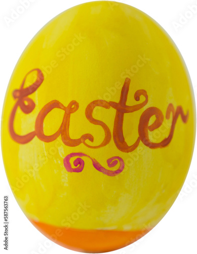 Close-up of Easter text on yellow egg
