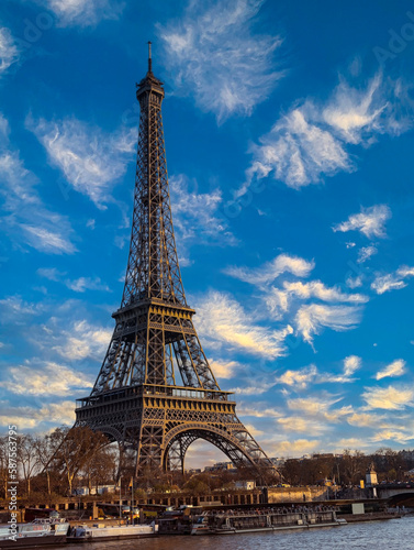 The Eiffel Tower, iconic Paris landmark as autumn trees park as Seine river with sunset sky scene in Paris ,France