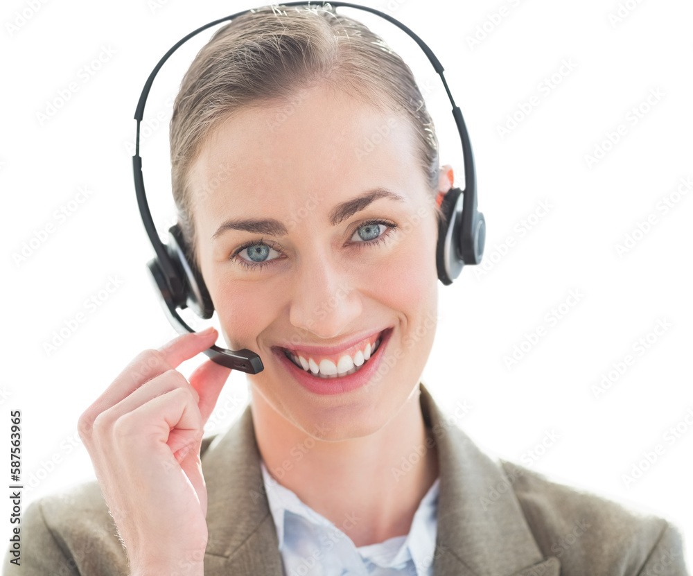 Smiling businesswoman with headset looking at camera Smiling businesswoman with headset looking at camera