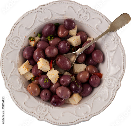 Black olives with cheese served in plate