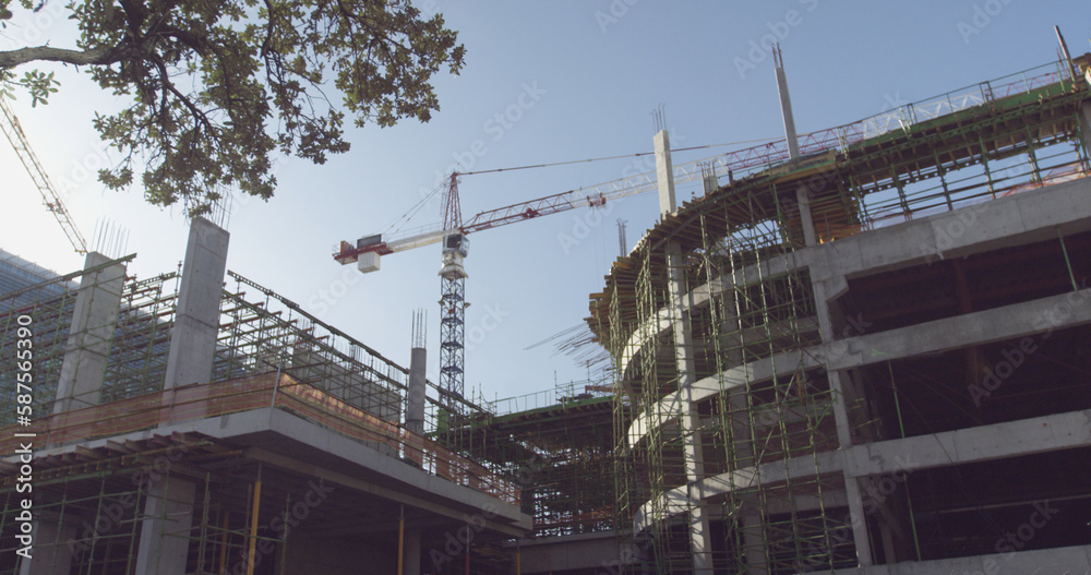 Fototapeta premium Crane and building at construction site