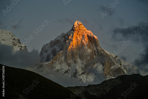 Fast Ray of Sun is kissing the peak of Mt. Thalayasagar on the way to kedartal photo