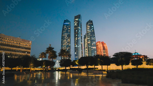 A city skyline with the lights on