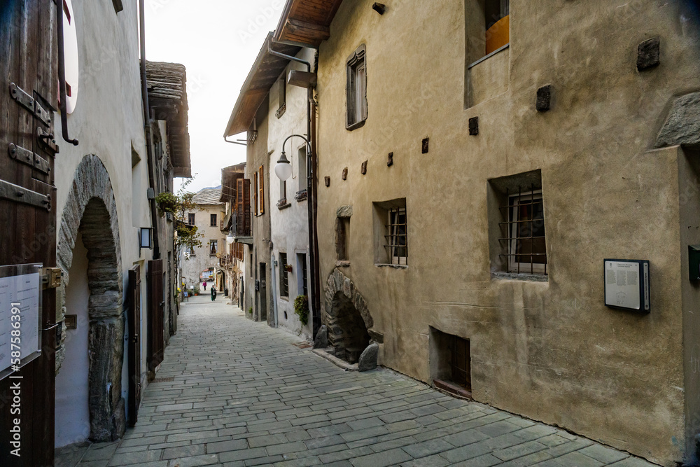 Bard, Italy. Ancient buildings in the historic center of the ancient village. View from Via Vittorio Emanuale II. 2023-03-25.
