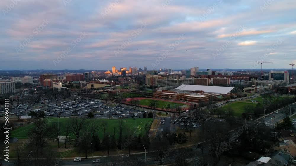 Aerial Lockdown Shot Of Downtown District With Cars Moving On Roads In City At Sunset - Nashville, Tennessee Aerial Lockdown Shot Of Downtown District With Cars Moving On Roads In City At Sunset - Nashville, Tennessee