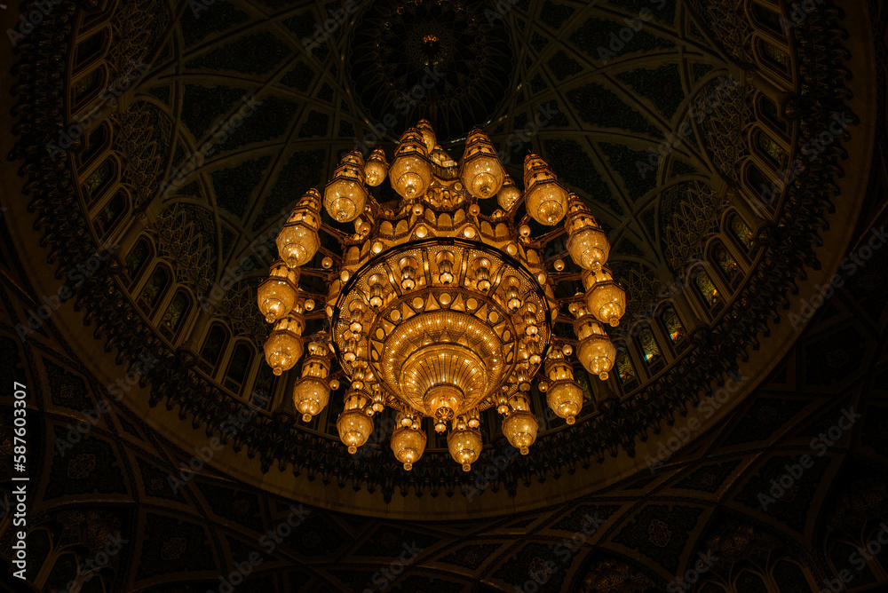 Bejeweled crystal and gold chandelier in the Sultan Qaboos Grand Mosque, Muscat, Oman