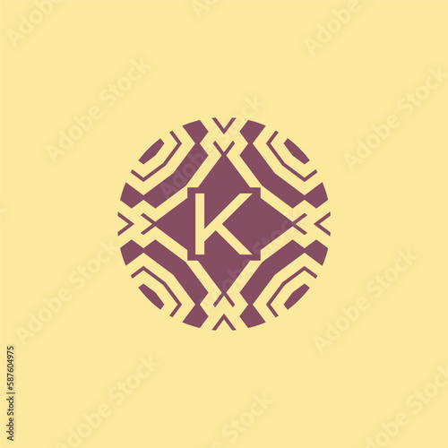 Initial letter K circle frame unique tribe pattern logo