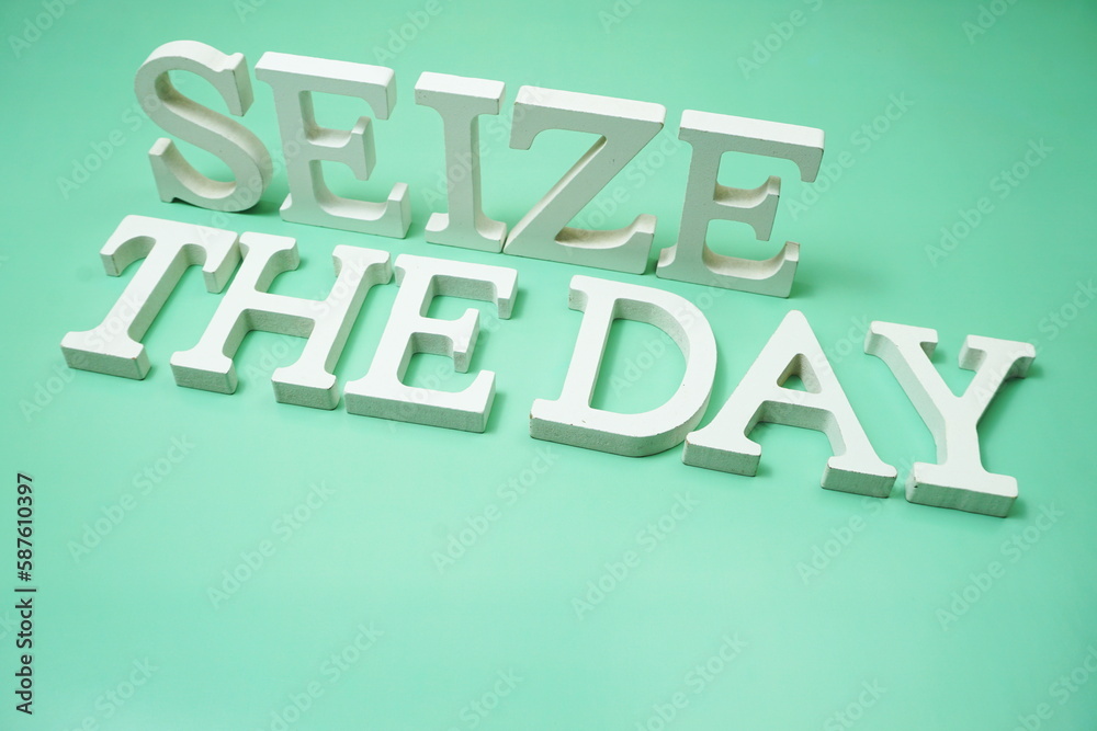 Seize The Day alphabet letters on green background