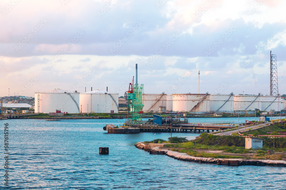 Oil harbor. Refinery and oil storage on the shore of the Gulf of Curacao, Dutch Antilles.