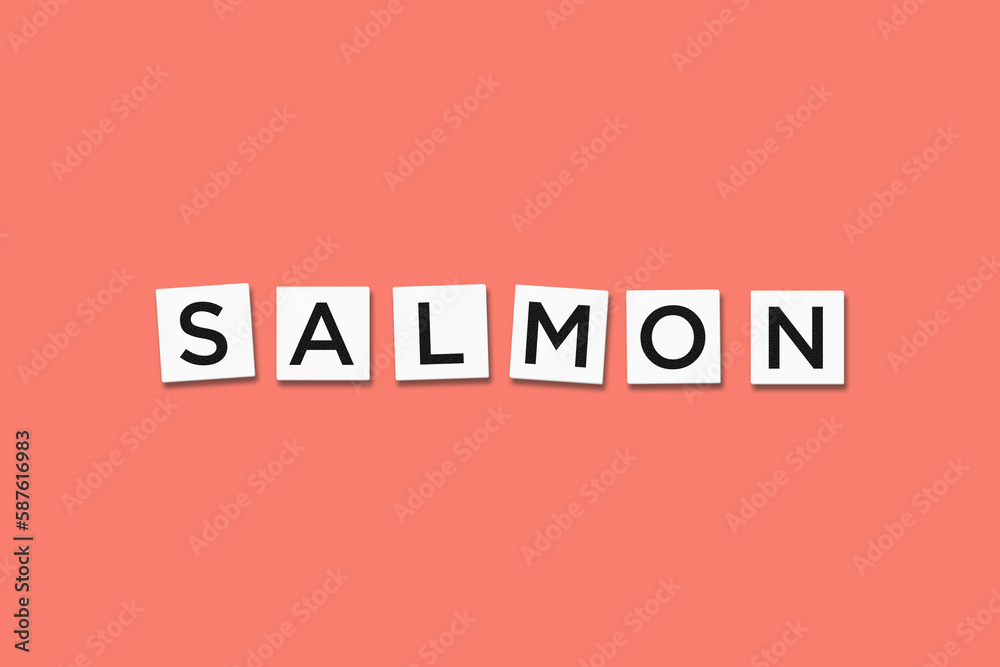 The word SALMON, spelt with letter Scrabble tiles on a salmon background The word SALMON, spelt with letter Scrabble tiles on a salmon background