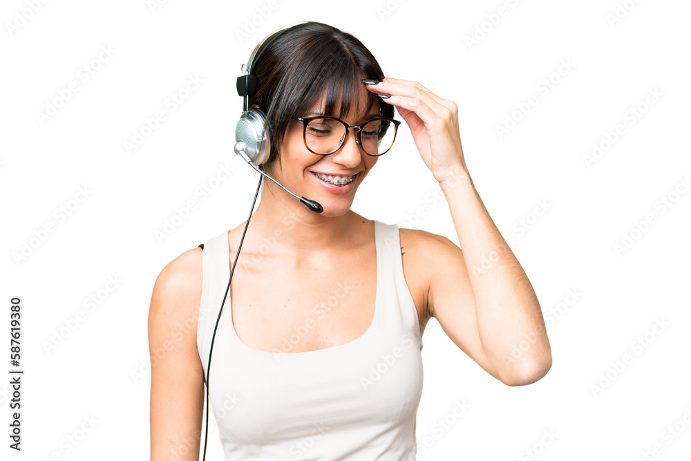 Telemarketer caucasian woman working with a headset over isolated background laughing Telemarketer caucasian woman working with a headset over isolated background laughing