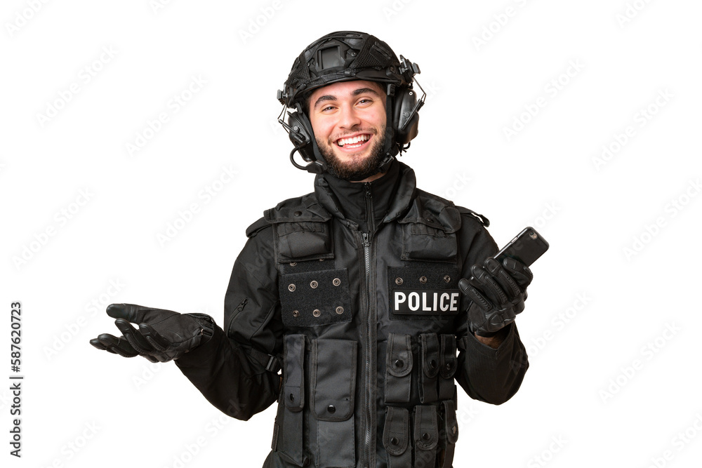 SWAT over isolated chroma key background keeping a conversation with the mobile phone with someone SWAT over isolated chroma key background keeping a conversation with the mobile phone with someone