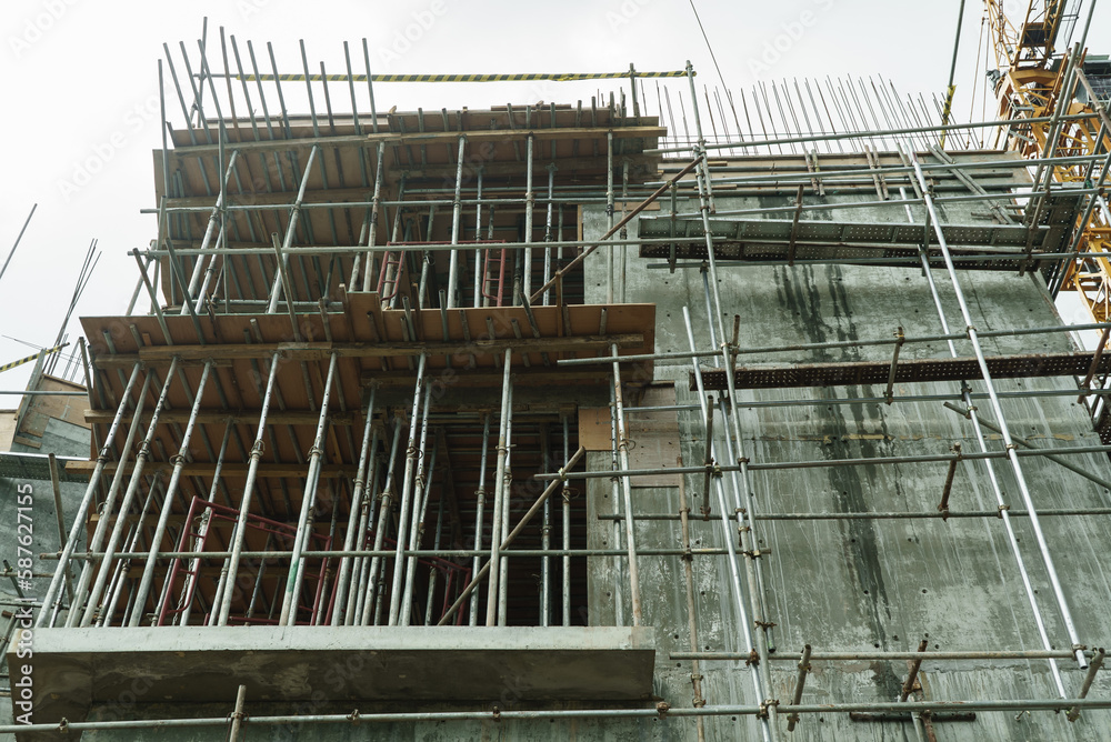 Scaffolding on the construction of a concrete multi-storey building