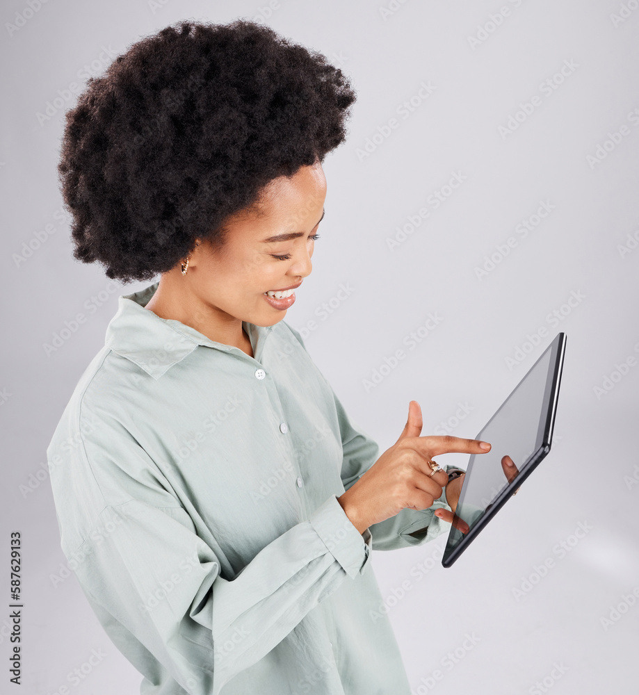 Digital tablet, search and happy black woman in studio for social media, browsing and internet on grey background. Online, app and female smile while streaming, texting or reading while isolated Digital tablet, search and happy black woman in studio for social media, browsing and internet on grey background. Online, app and female smile while streaming, texting or reading while isolated