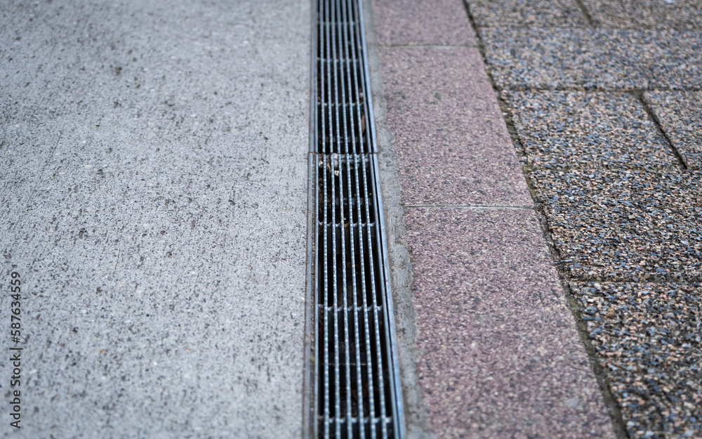 custom made wallpaper toronto digitalStainless steel grated flood water storm drain on a Tokyo sidewalk, Japan