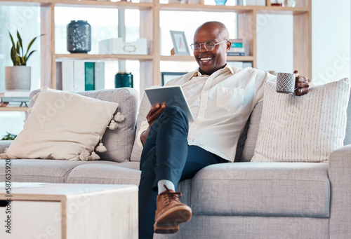 Canvas Print Tablet, coffee break and relax with a black man on the sofa, sitting in the living room of his home or office