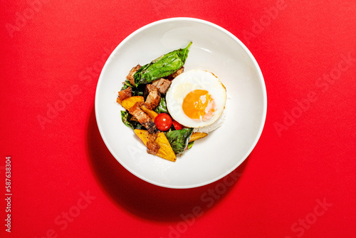rice with fried egg and vegetables