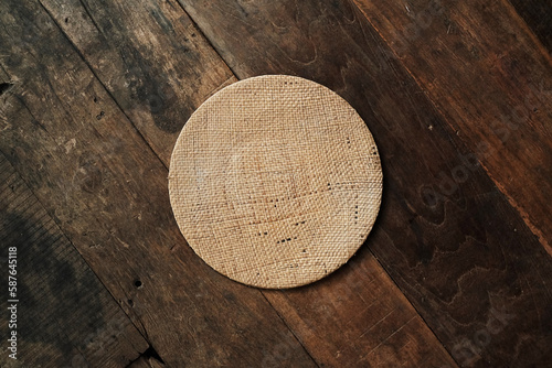 Mendong leaf coasters on a wooden floor photo