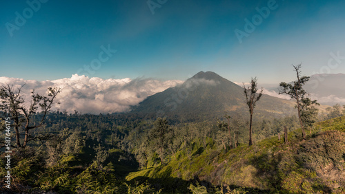 Amazing volcanic landscape of Ijen volcano complex during sunrise, Java, Indonesia photo