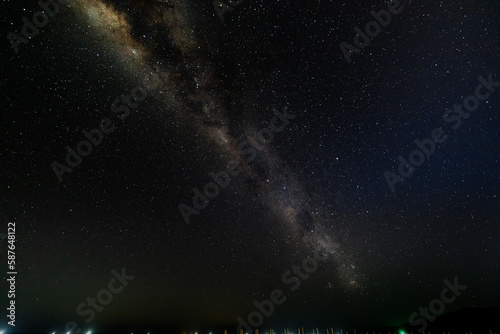 Long night exposure on remote tropical island Karimunjava (Indonesia) revealing amazing lights of milky way and millions of stars  photo