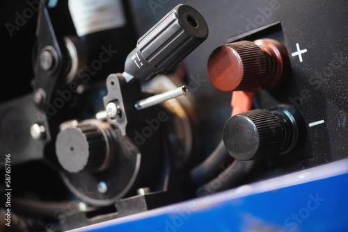 Pressure roller of the semi automatic welding machine close up.