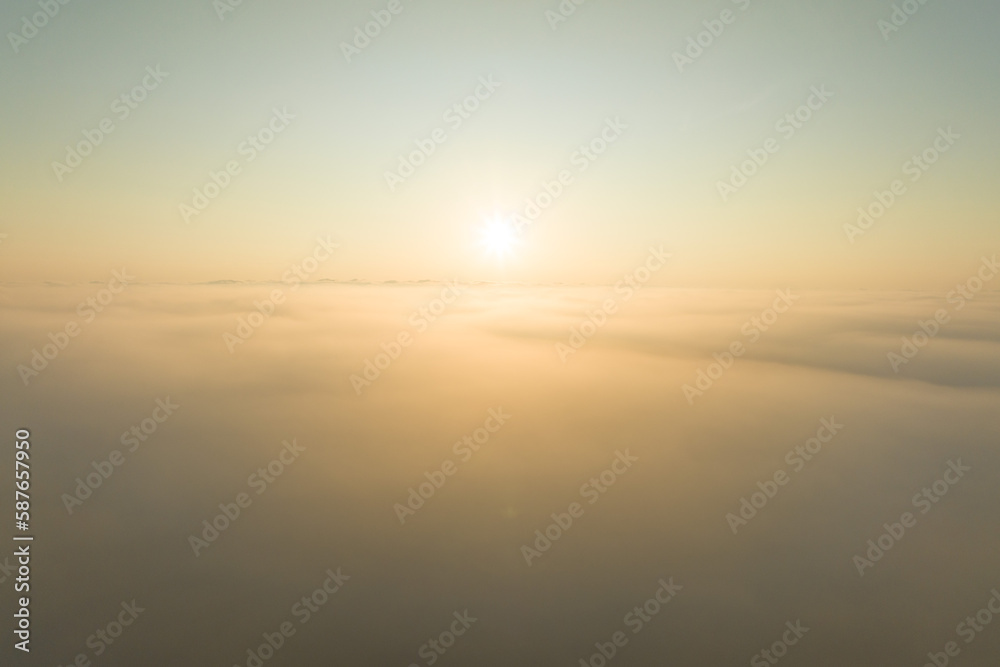 Aerial view Beautiful foggy morning sunrise over cloud foggy