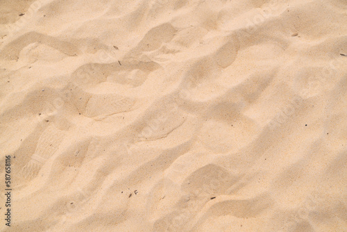 Close up Nature Beach Sand Soft Texture In Summer Sun.