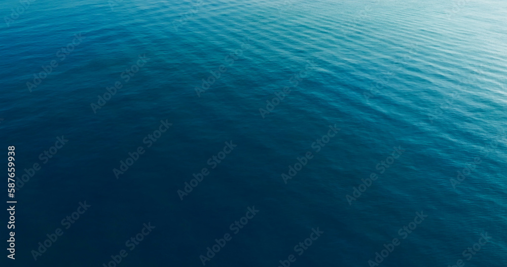 Top- view blue seawater texture, Sunshine Refection on blue water wave texture background. Top- view blue seawater texture, Sunshine Refection on blue water wave texture background.