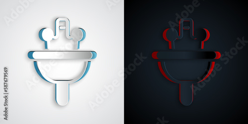 Paper cut Washbasin with water tap icon isolated on grey and black background. Paper art style. Vector