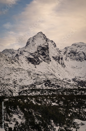 Winter mountain landscape in Polish Tatra Mountains. Snowy morning with a view of the Koscielec mountain in the Tatra National Park.