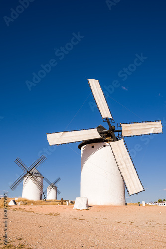 Ancient windmill in Campo de Criptana (Spain) with the blades covered by a cloth ready to go into operation