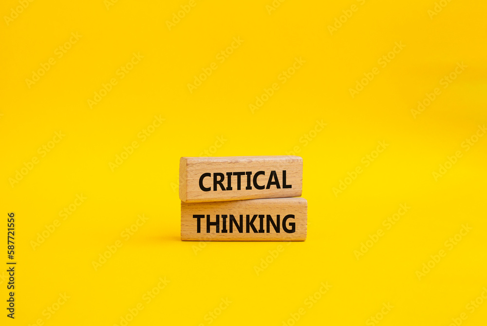 Critical thinking symbol. Wooden blocks with words Critical thinking. Beautiful yellow background. Business and Critical thinking concept. Copy space. Critical thinking symbol. Wooden blocks with words Critical thinking. Beautiful yellow background. Business and Critical thinking concept. Copy space.