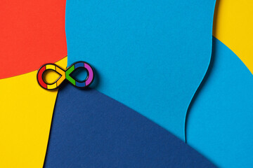 World Autism Awareness Day, Autism Acceptance Month concept.Autism infinity rainbow symbol sign on colorful background. Autism rights movement, neurodiversity, autistic acceptance movement symbol sign