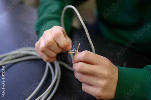 Technician holding ethernet cable
