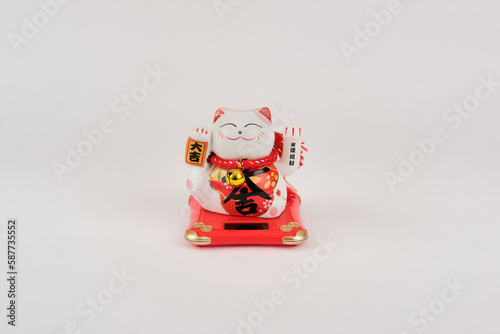 One white and red chinese good fortune luck cat