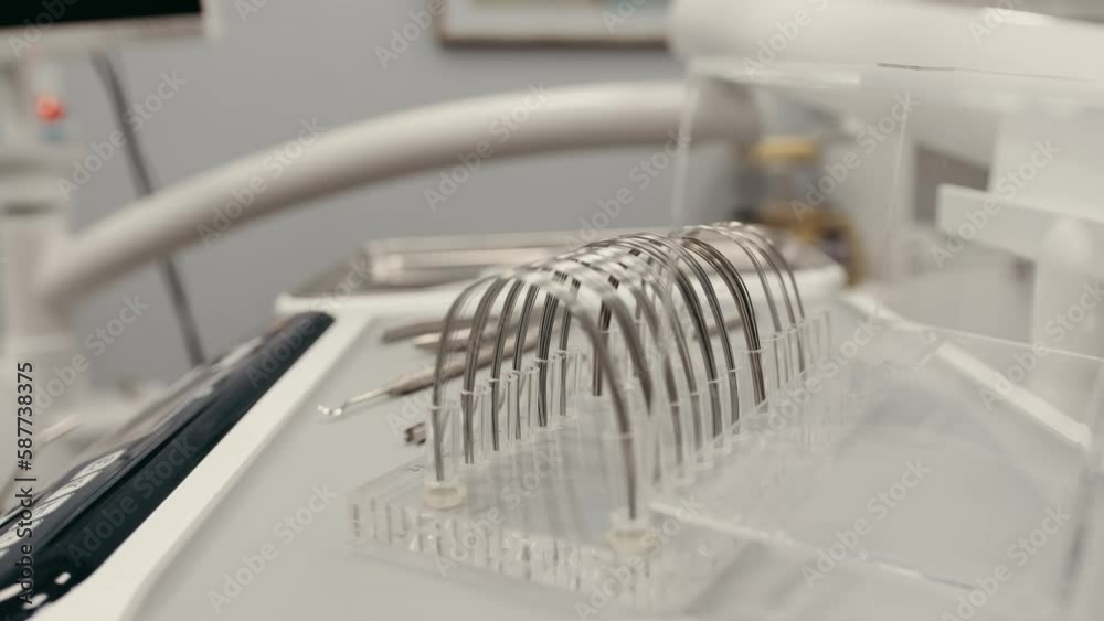 Orthodontic arcs for braces close-up in the dental clinic on the table Orthodontic arcs for braces close-up in the dental clinic on the table