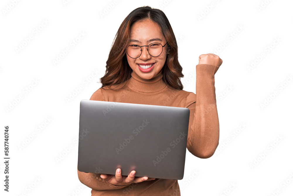 A young asian woman working with her laptop A young asian woman working with her laptop