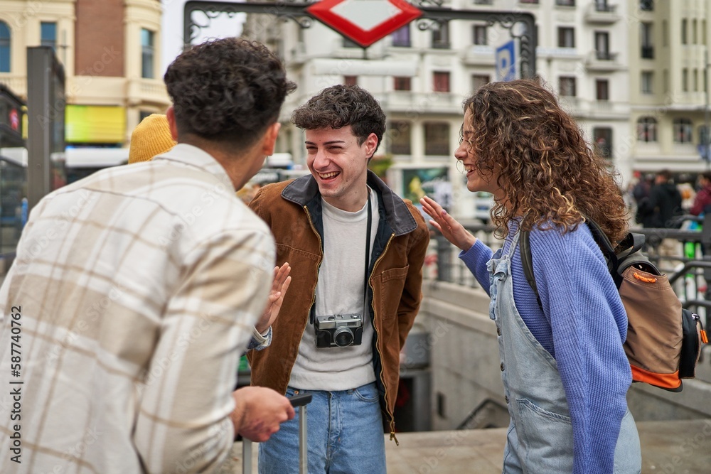 A circle of friends from diverse backgrounds, chatting and bonding while enjoying their vacation in Madrid. A circle of friends from diverse backgrounds, chatting and bonding while enjoying their vacation in Madrid.