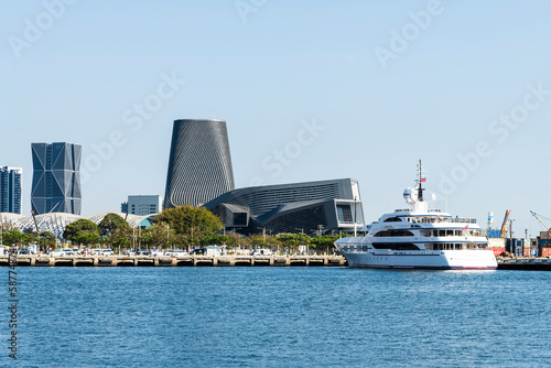 Kaohsiung, Taiwan- March 23, 2023: Building view of the Kaohsiung Port Cruise Terminal in glory pier of Kaohsiung, Taiwan. with a yacht docked on the shore. © BINGJHEN