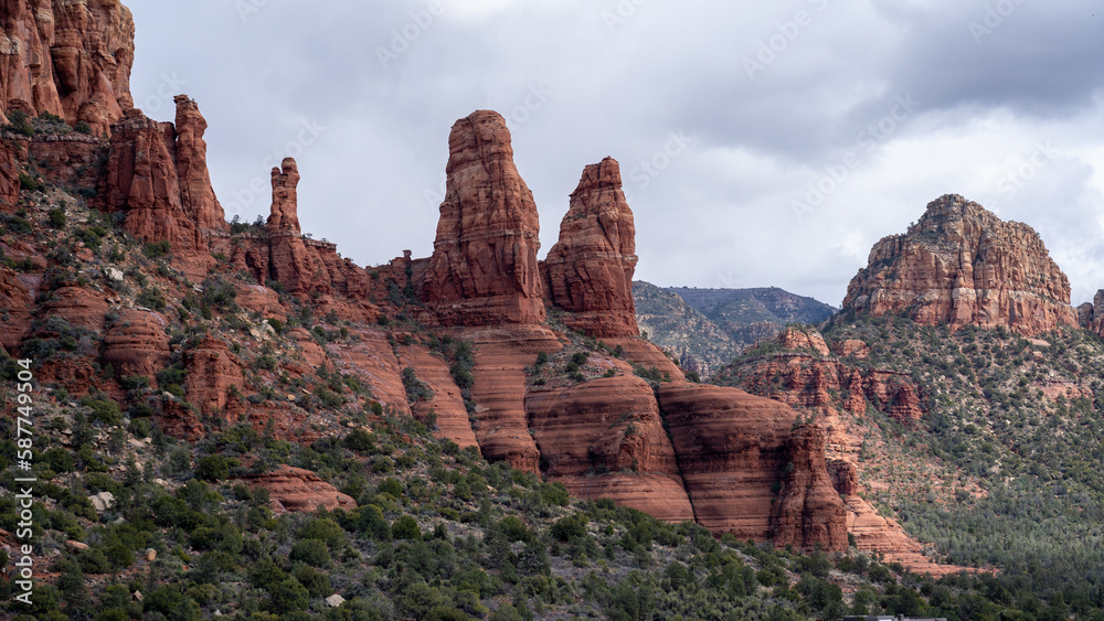 View of Sedona, Arizona. Surrounded by red-rock buttes, steep canyon walls and pine forests.
