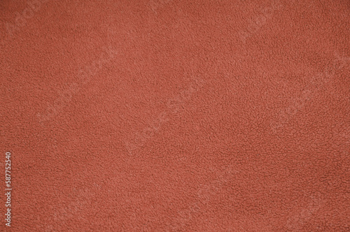 red unusual texture. fleece brown surface . fabric factory concept
