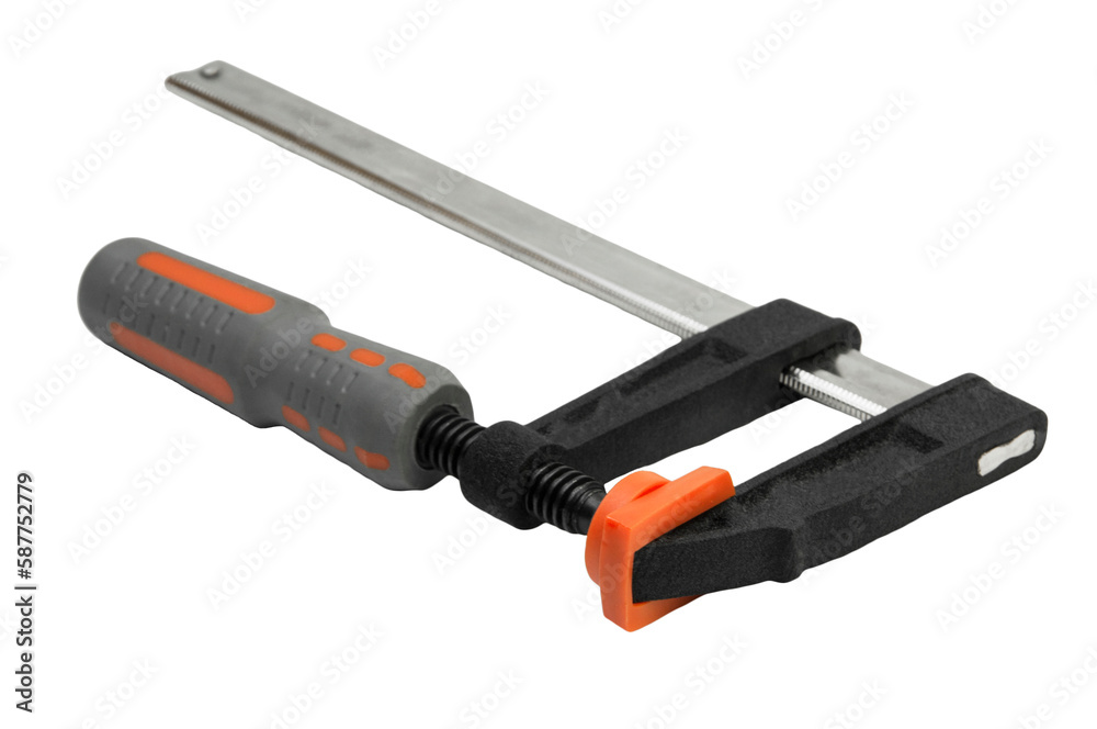metal adjustable clamp on a white background. industrial powerful clamp on the table. wood gluing concept. fixing device on a work texture metal adjustable clamp on a white background. industrial powerful clamp on the table. wood gluing concept. fixing device on a work texture