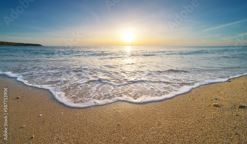 Beautiful sunset on the sea shore beach. © GIS