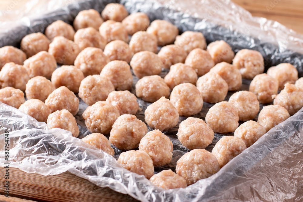 Frozen meatballs. Raw ingredients for cooking food Frozen meatballs. Raw ingredients for cooking food