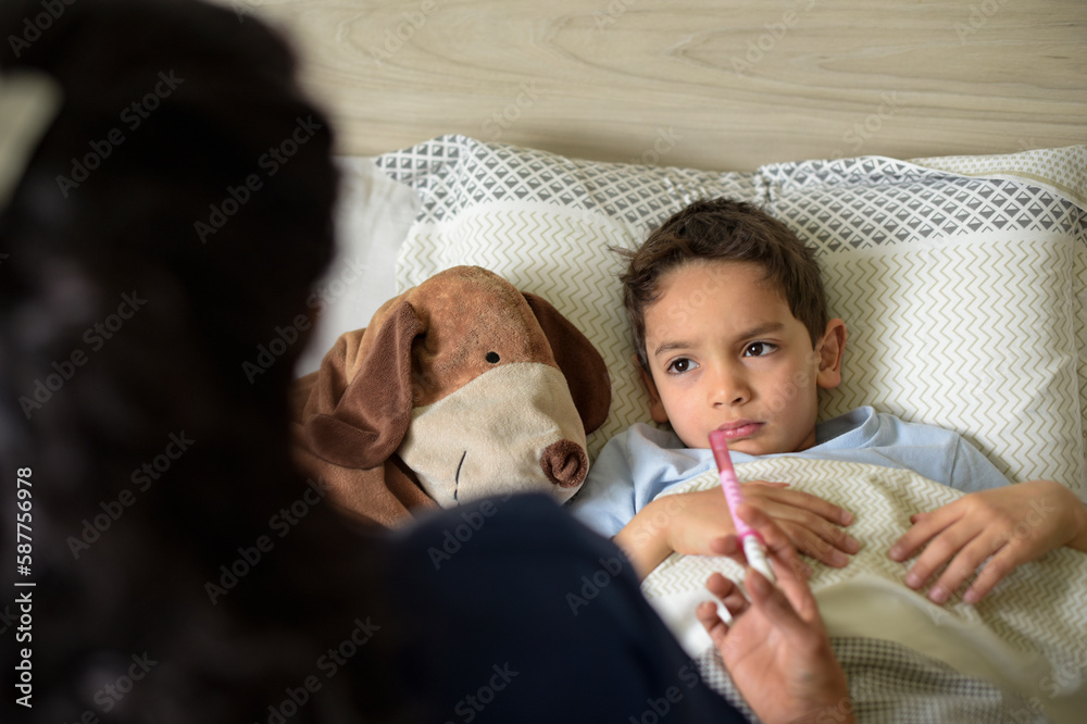 © AUFORT Jérome - sick young boy taking medicine